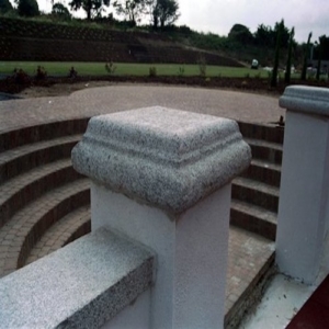 Granite-roundsided-pier-cap-and-flat-wall-capping